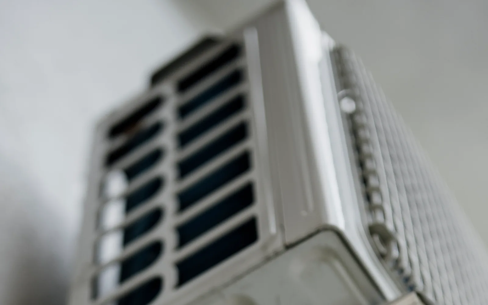 Licensed photo: wall-mounted indoor air-conditioning unit in a residential setting